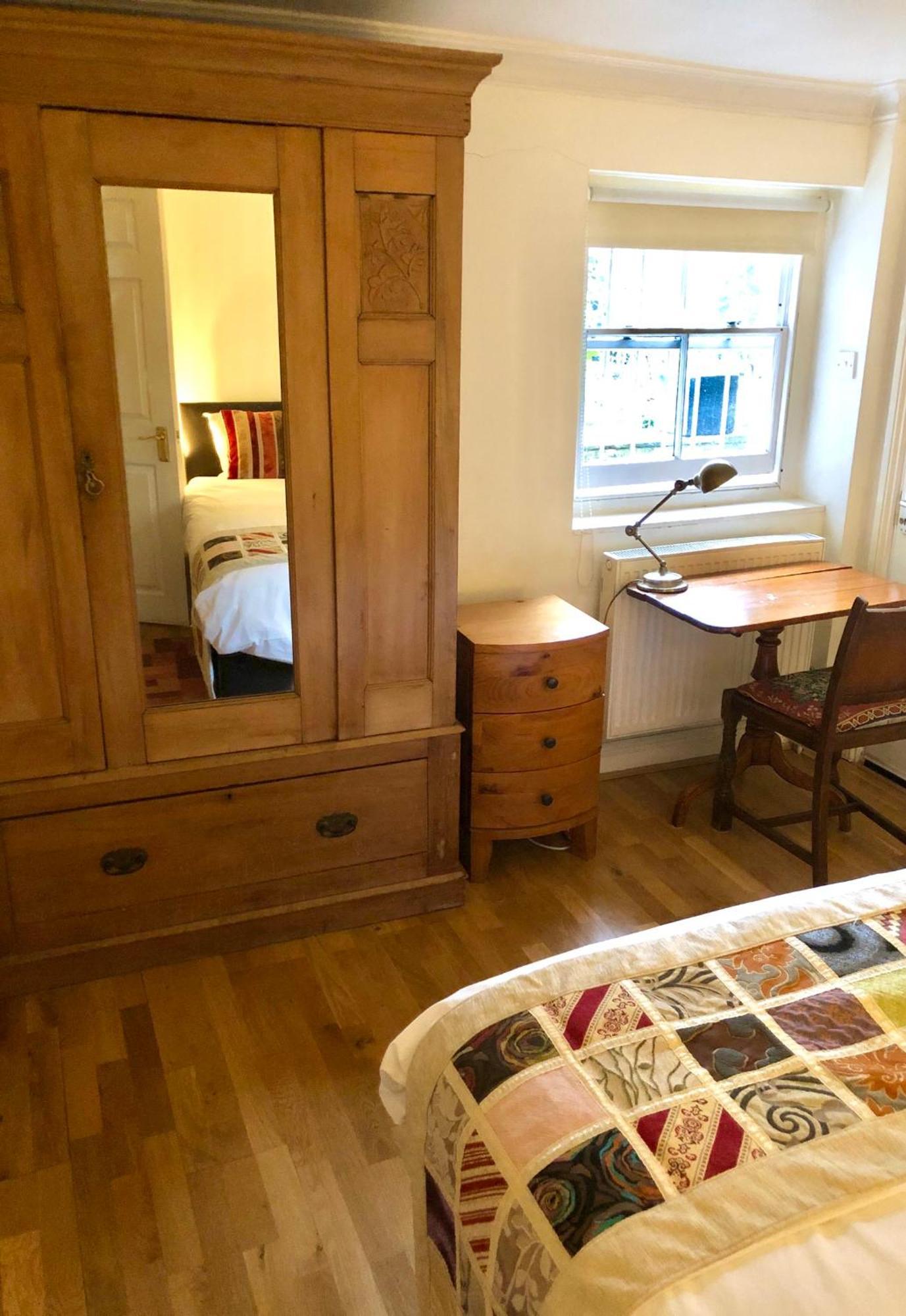 Griffin House Holiday Apartments Лондон Стая снимка